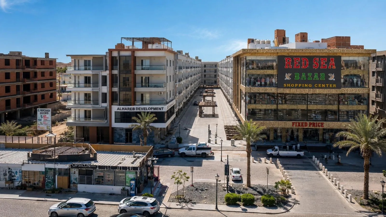 صورة من الموقع: Street front of the resort area on El Mamsha with the developer's office building, October 2026