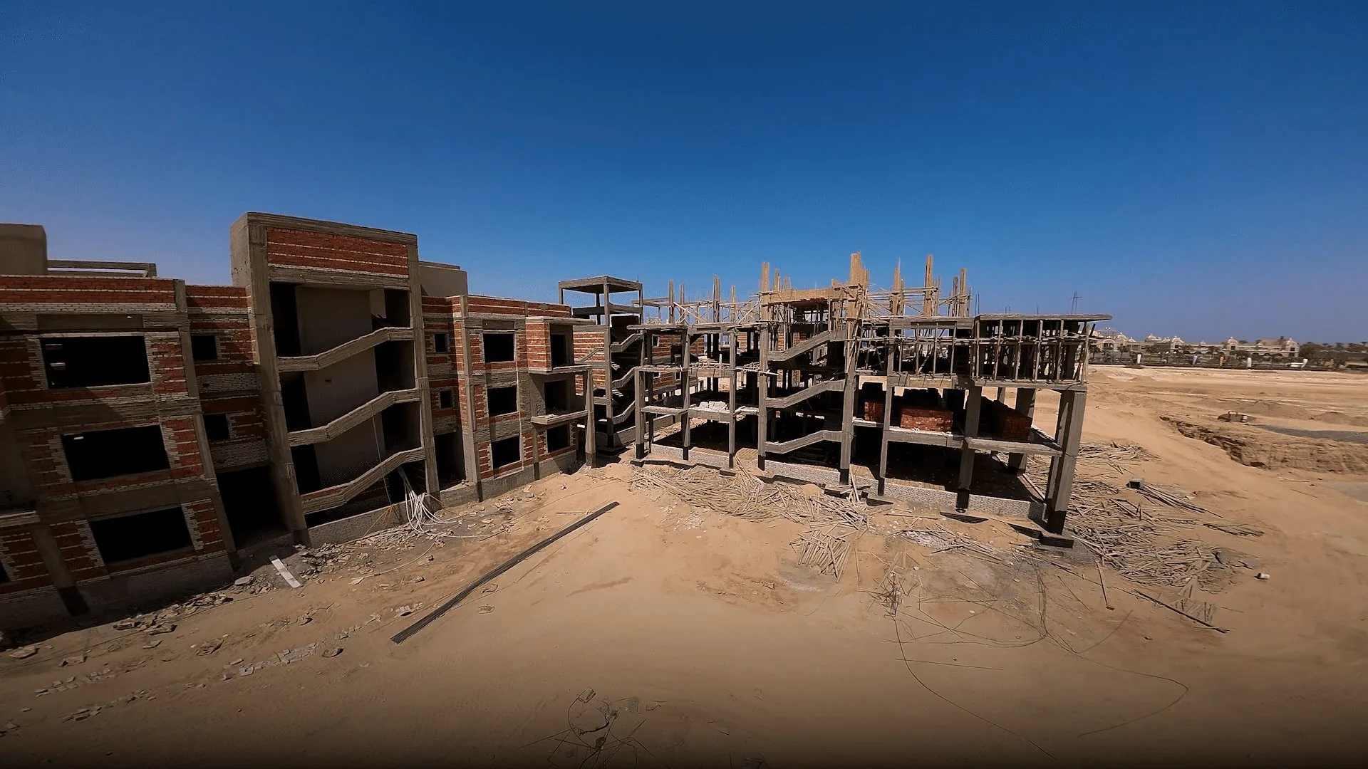 صورة من الموقع: Drone still: building structures on site (developer construction gallery)