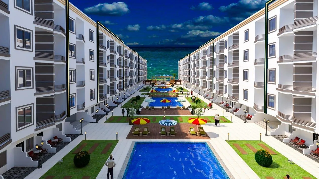 تصميم تخيلي: Developer's render of a courtyard with pools leading to the sea